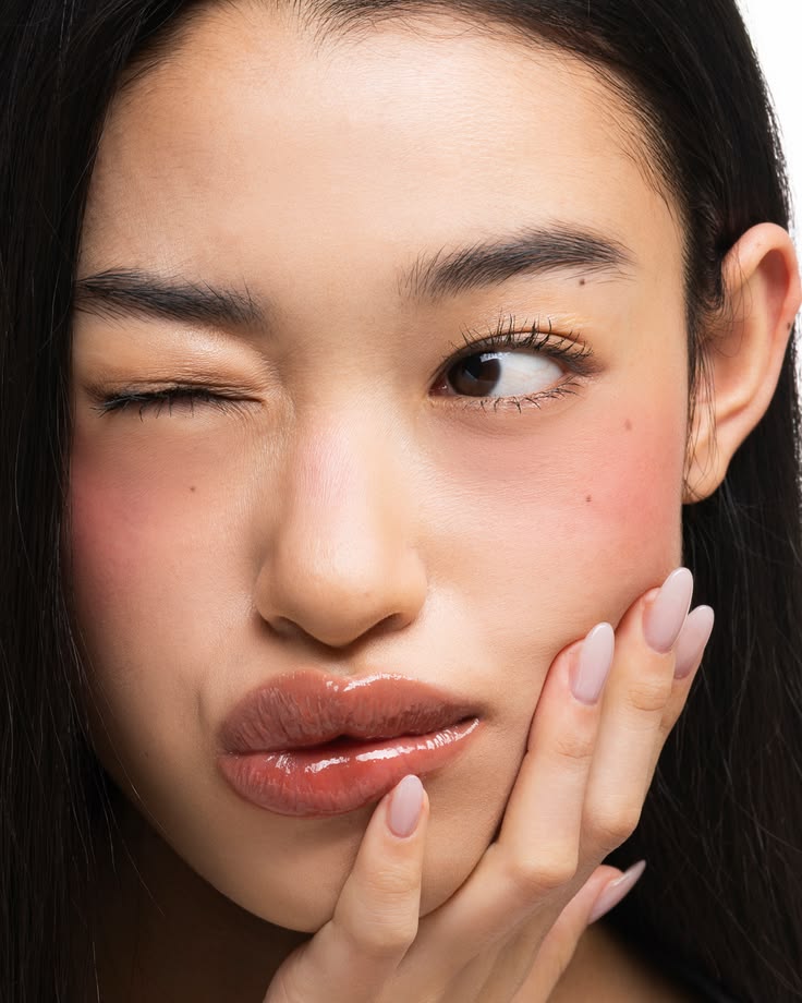 Portrait highlighting natural features and soft lip color